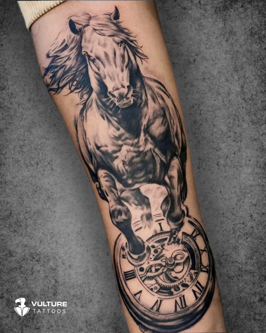 Galloping Horse And Clock — tattoo by Vulture Tattoos, Gurugram