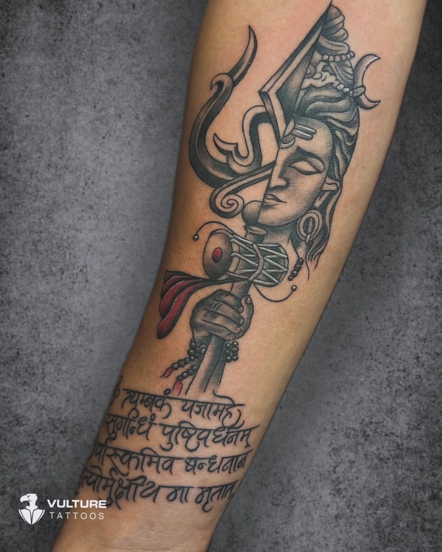 Half-Face Shiva With Damru — tattoo by Vulture Tattoos, Gurugram