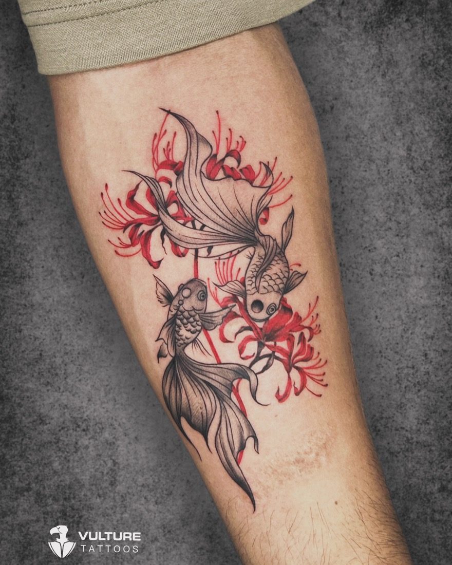 Goldfish With Red Lilies — tattoo by Vulture Tattoos, Gurugram
