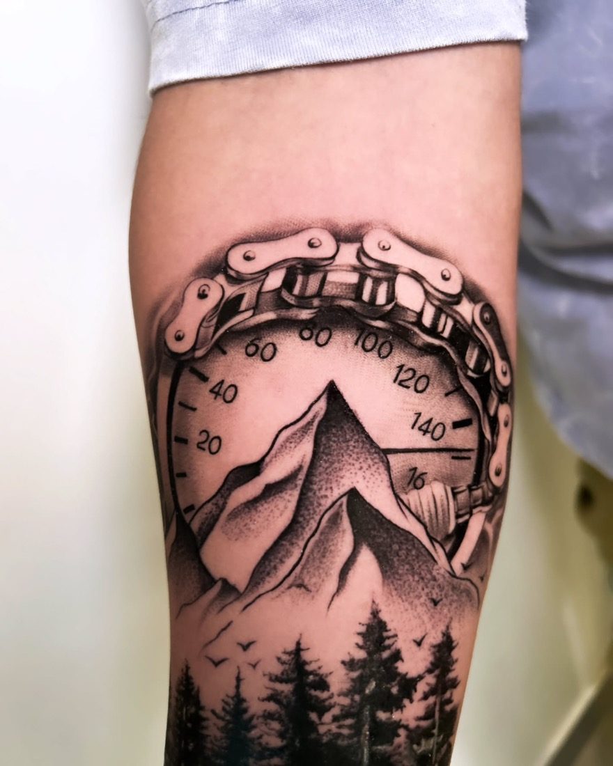 Speedometer Mountain Forest Scene — tattoo by Vulture Tattoos, Gurugram