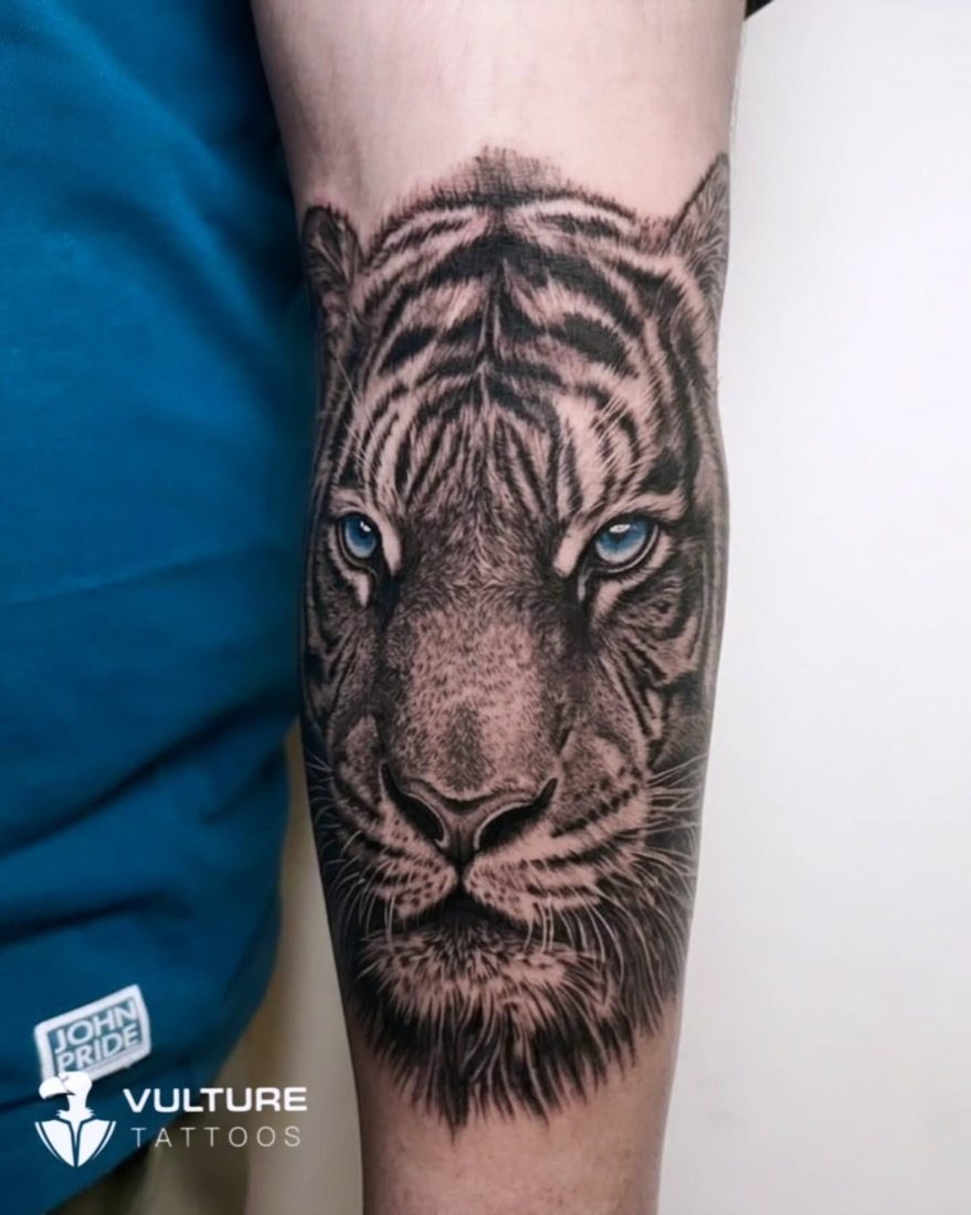 Blue-Eyed White Tiger — tattoo by Vulture Tattoos, Gurugram