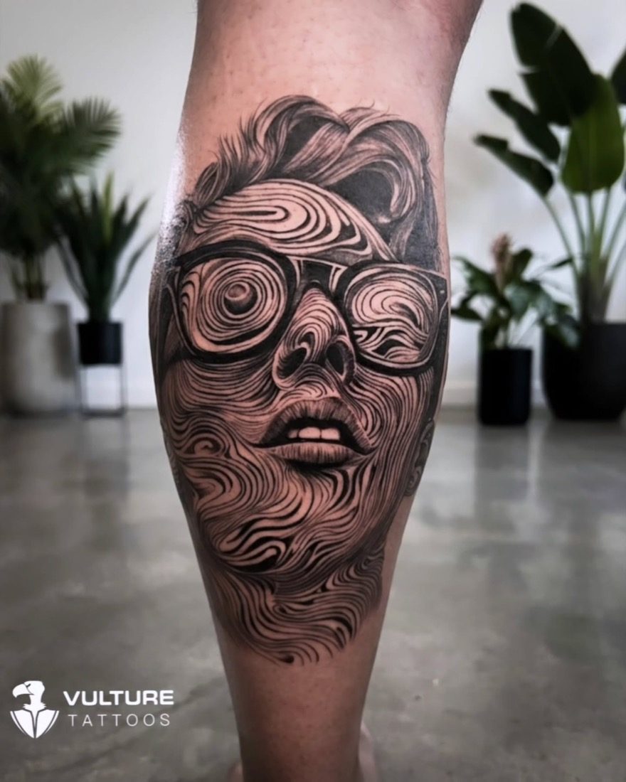 Swirling Line Woman Portrait — tattoo by Vulture Tattoos, Gurugram