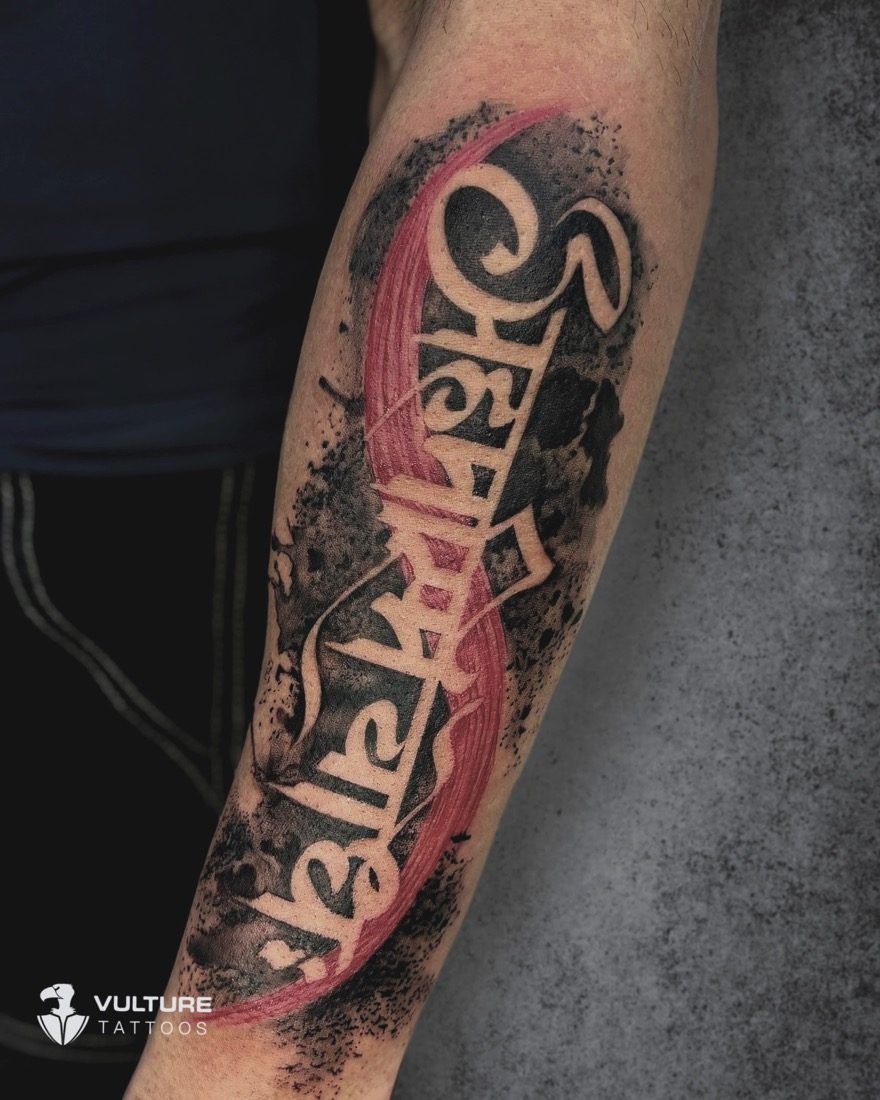 Trash Polka Script Lettering — tattoo by Vulture Tattoos, Gurugram