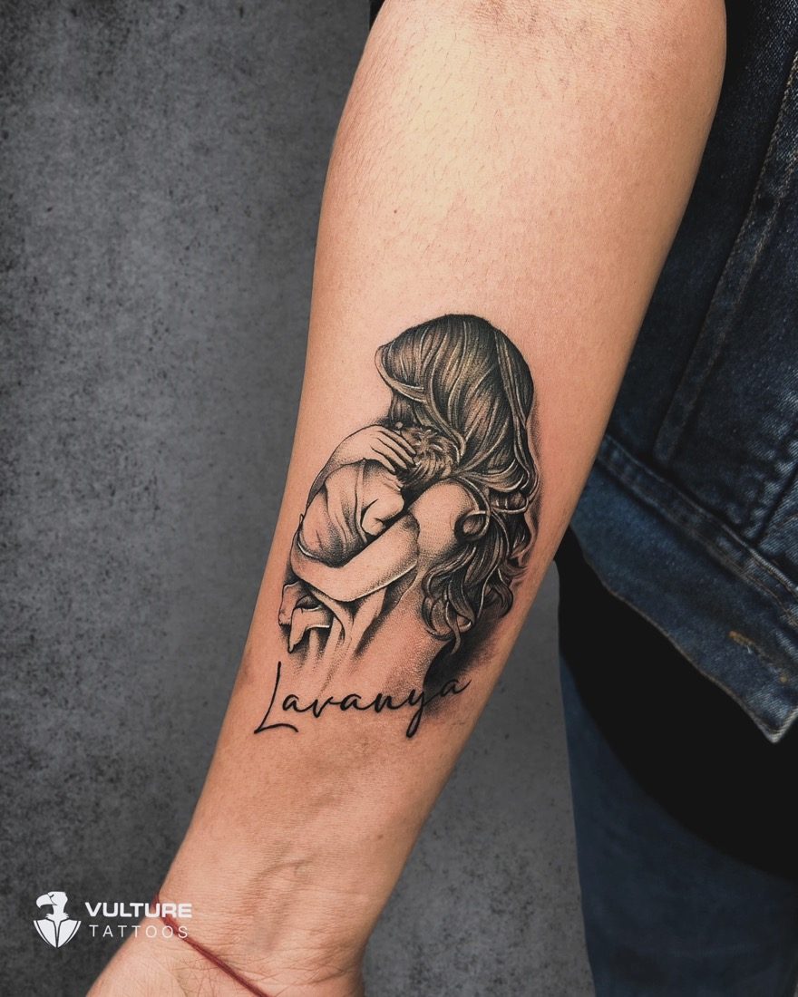 Mother And Child Embrace — tattoo by Vulture Tattoos, Gurugram