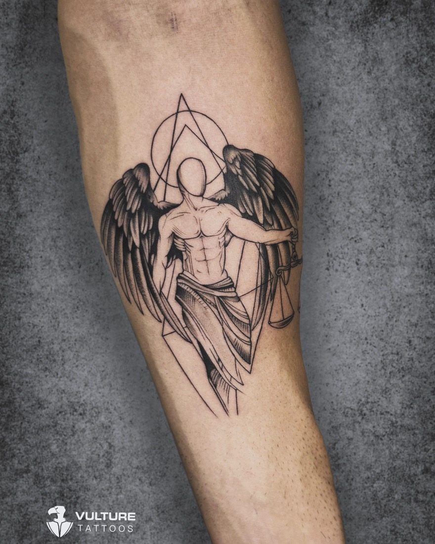 Geometric Angel With Scales — tattoo by Vulture Tattoos, Gurugram