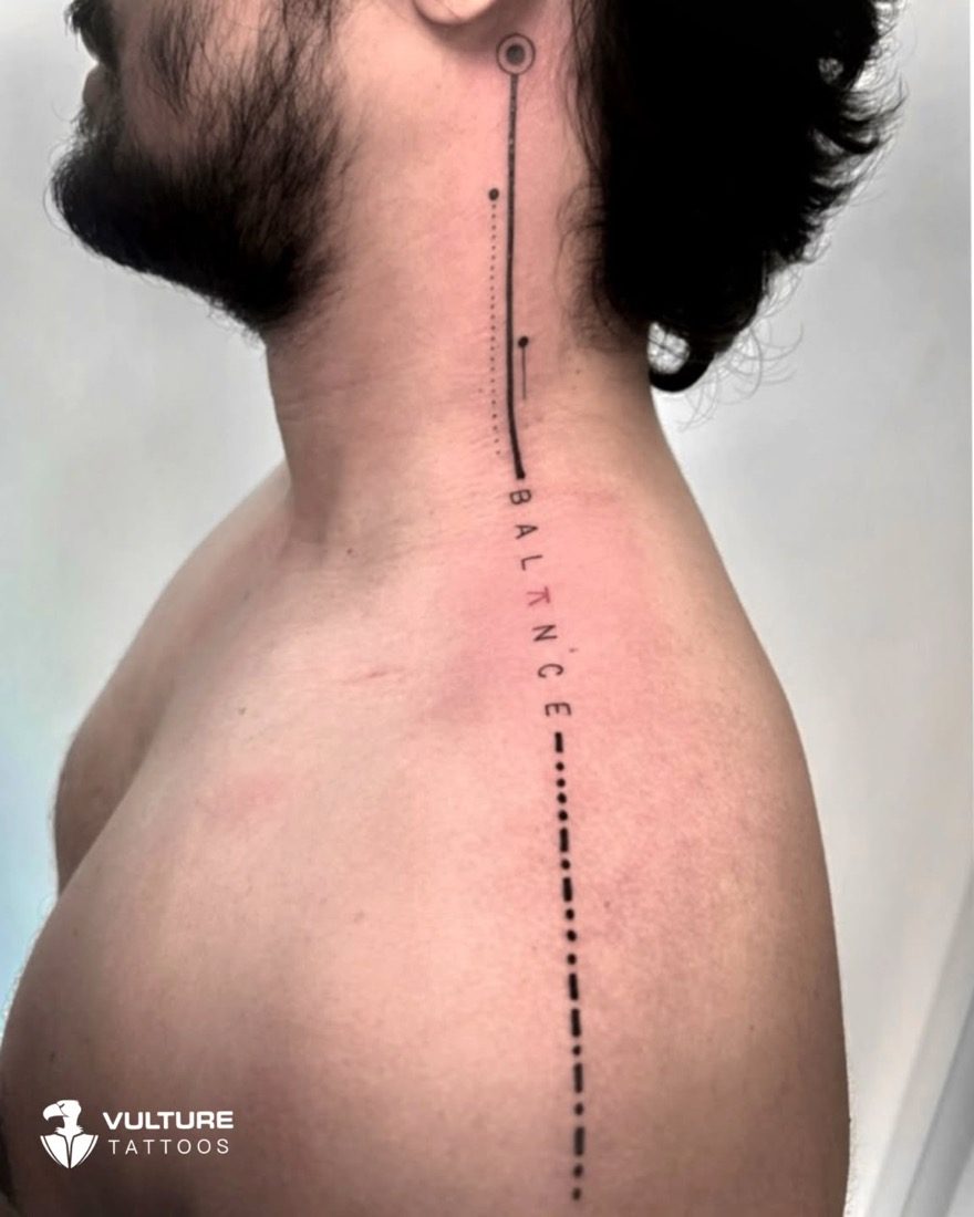 Balance Minimal Spine Lettering — tattoo by Vulture Tattoos, Gurugram