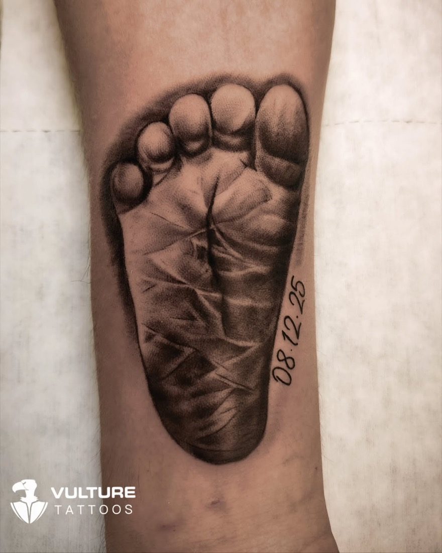 Baby Footprint With Date — tattoo by Vulture Tattoos, Gurugram