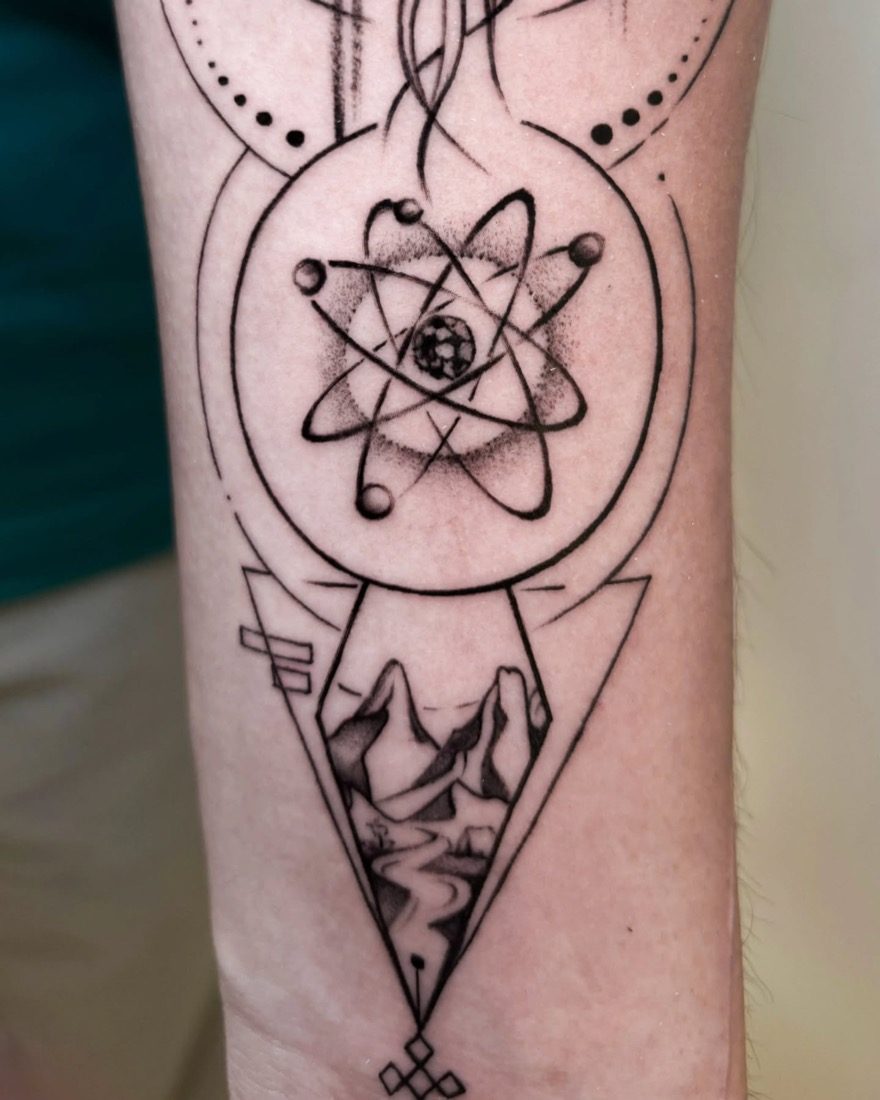 Atom And Mountain Geometry — tattoo by Vulture Tattoos, Gurugram