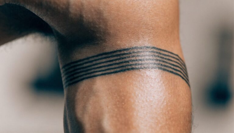 Armband tattoo in Gurgaon — geometric black band at Vulture Tattoos
