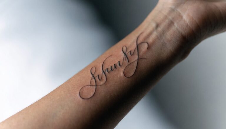 Name and script tattoo in Gurgaon — fine-line calligraphy at Vulture Tattoos