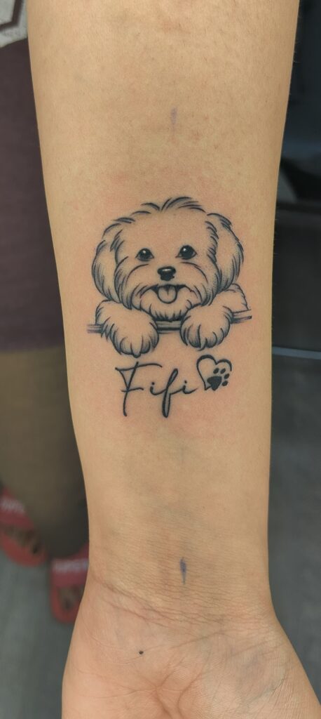 Black and grey dog portrait tattoo on forearm, Vulture Tattoos Gurgaon
