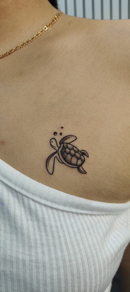 Small fine-line tattoo on a wrist, Vulture Tattoos Gurgaon