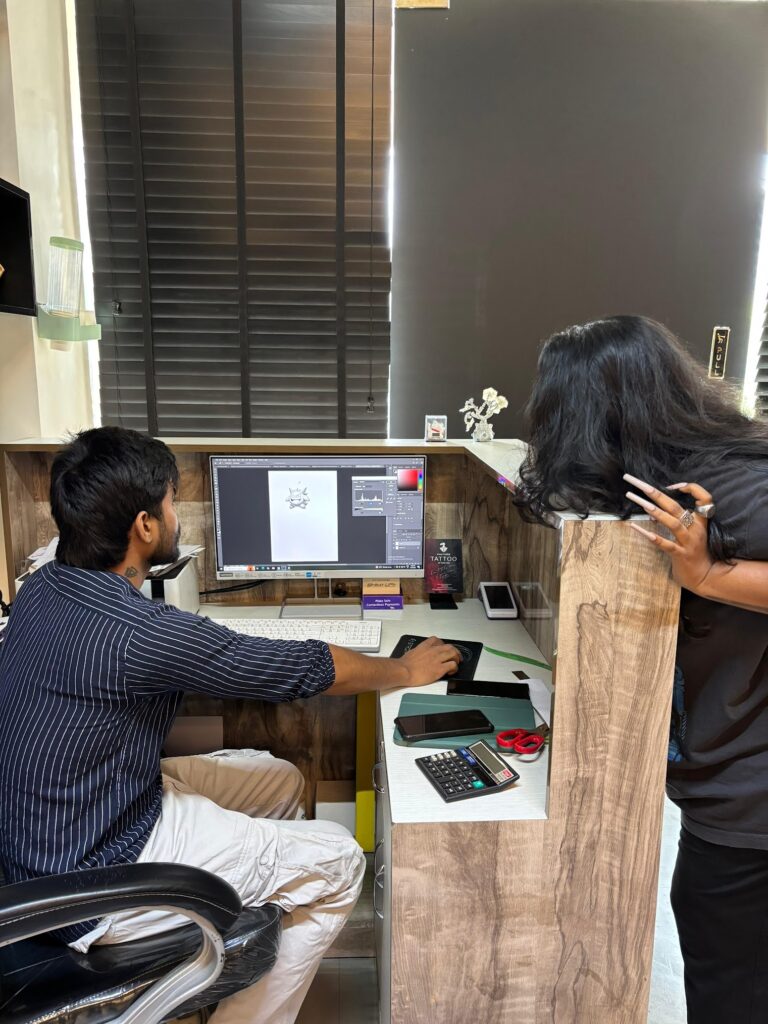 Tattoo session in progress on the outer forearm, Vulture Tattoos Gurgaon